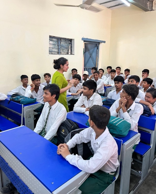 Sanya Ghai conducting an interactive workshop session with school students in a classroom